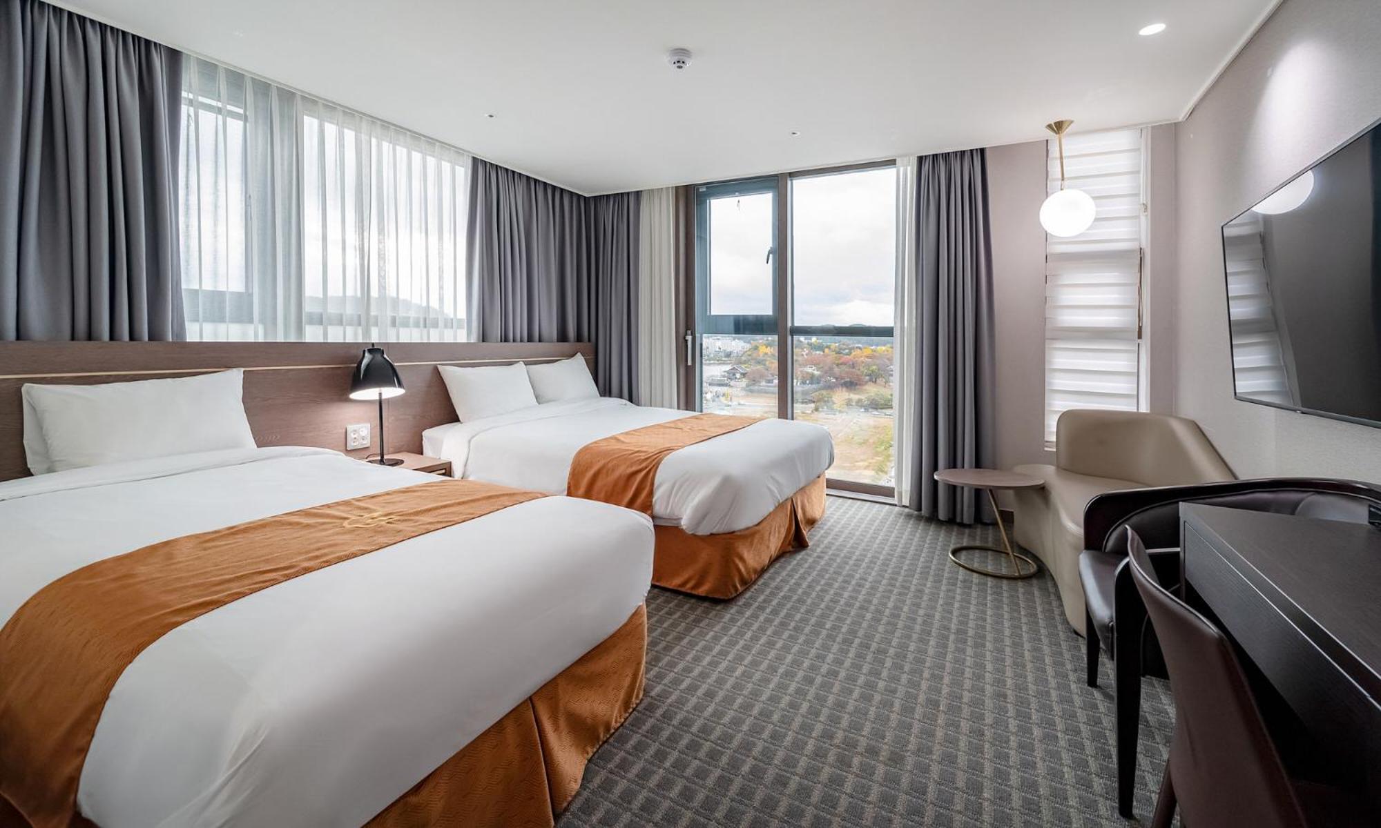 Golden Tulip Essential Namgang Hotel Джинджу Екстериор снимка